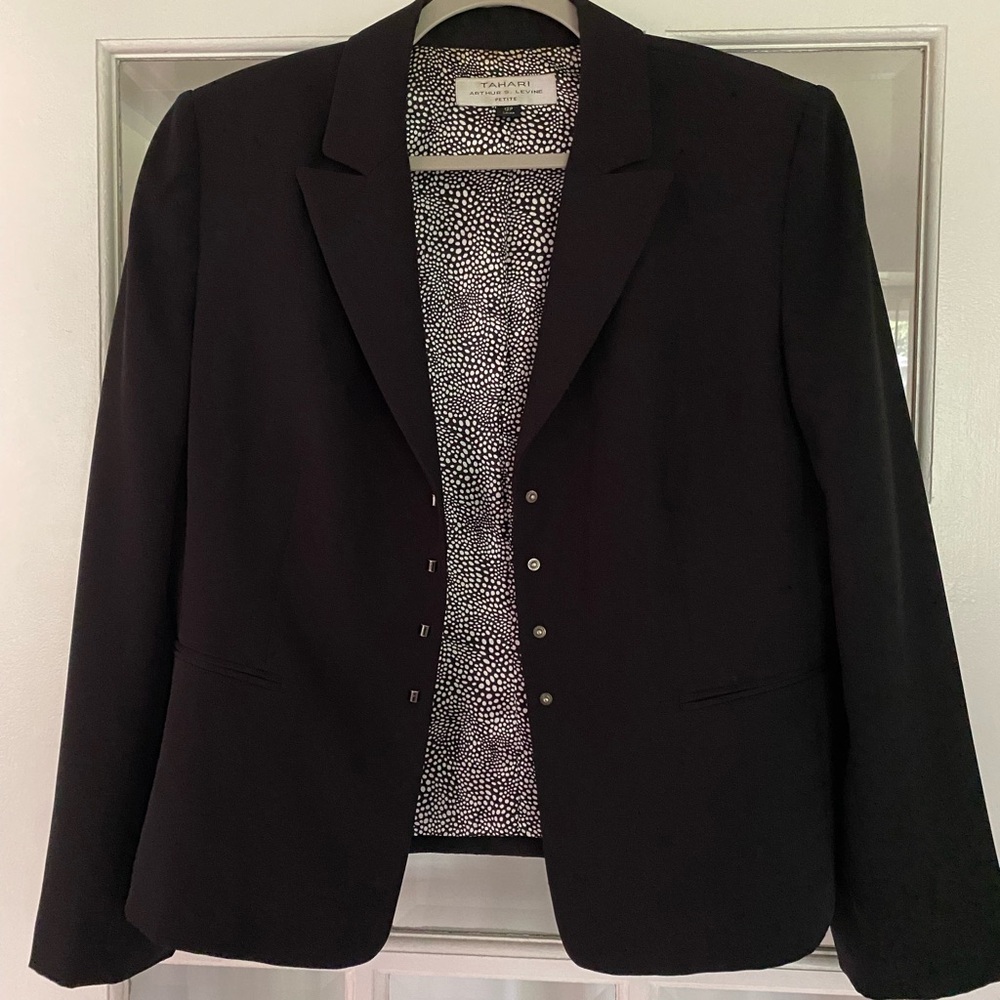 Woman’s suit jacket size 12p